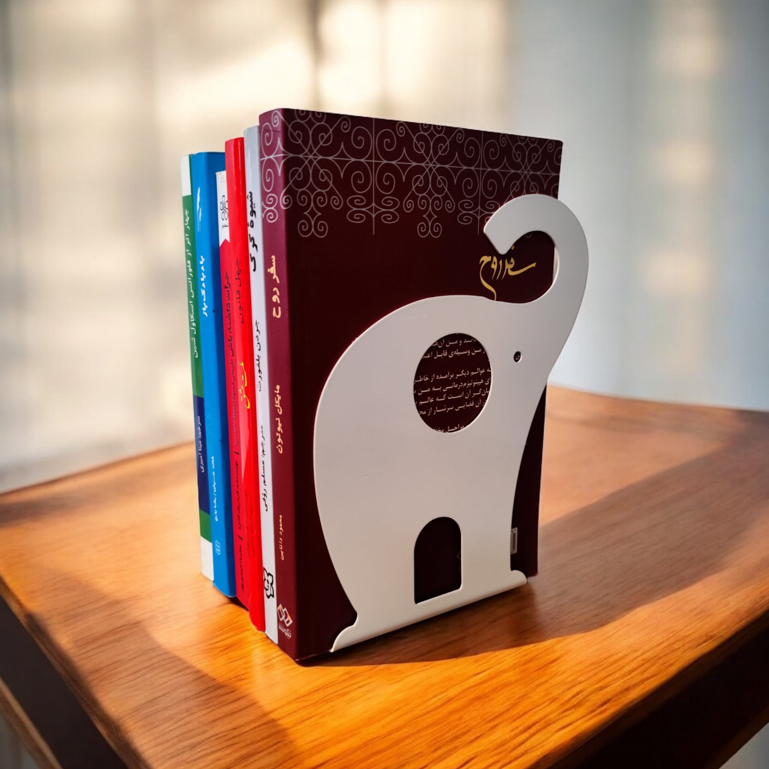 نگهدارنده کتاب نیتا متال طرح فیل